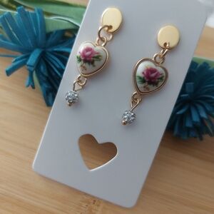 Gold Heart Earrings with Floral Accent